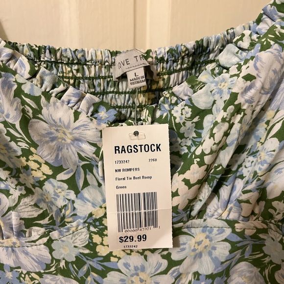 Floral tie bust romper NWT and never worn. Can fit medium or large imo. - Picture 3 of 3